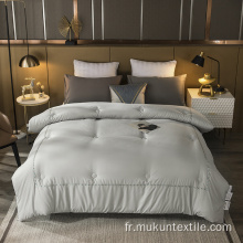 Housse de couette matelassée avec broderie polyester